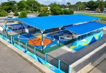Gobierno bolivariano Inaugura la cancha número 96 en el sector “El Esfuerzo” de los Villa Araure Vista aérea de la cancha deportiva techada El Esfuerzo, con superficie multicolor, gradas y estructura de techo azul, en Villa Araure.